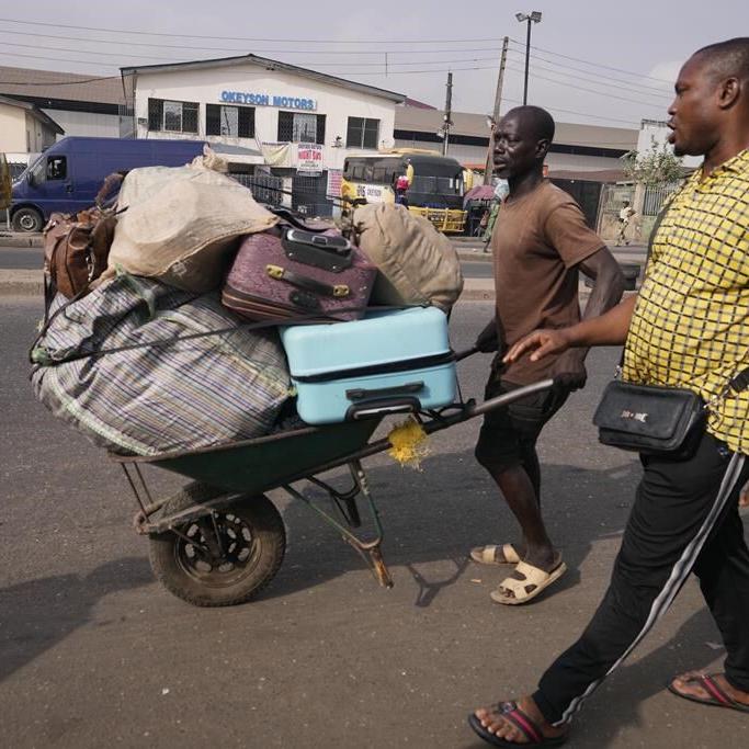 Nigeria slashes transport fees during the holidays to ease some of the pain of austerity measures